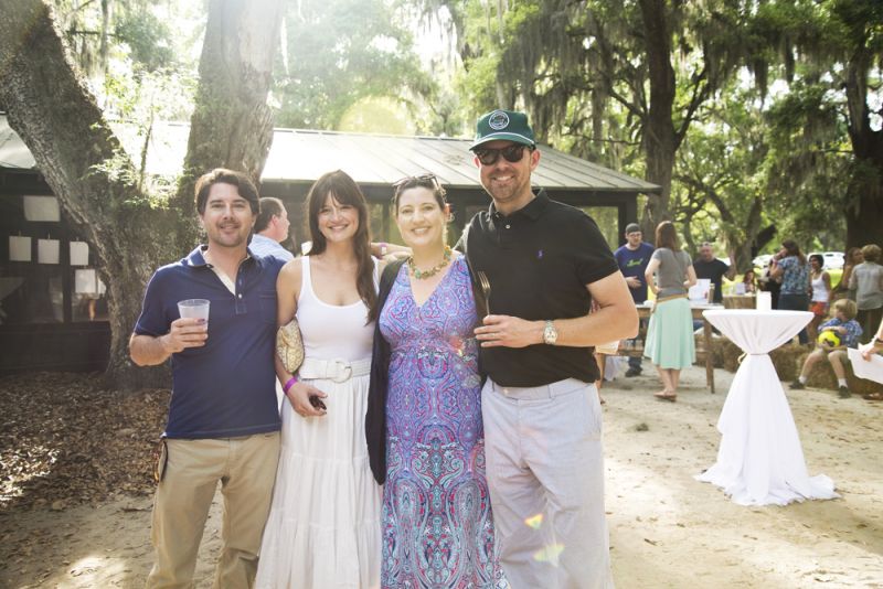 Dig South founder Stanfield Gray, Haskell Harris McKinney, Sunny Gray, and Marshall McKinney enjoy the weather before the live auction begins.