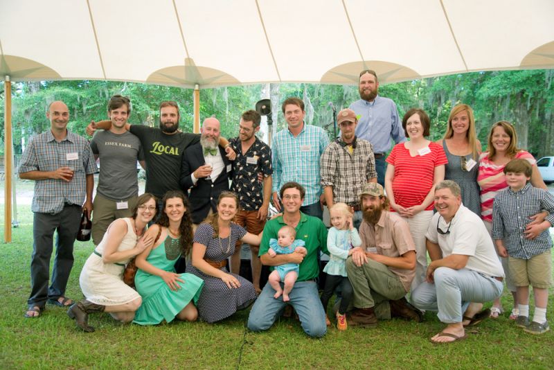 The local farmers gathered for a group shot