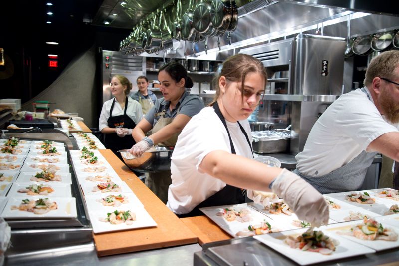 Little chef Tiffany Allen plated the night’s second course, a Thai seafood salad.